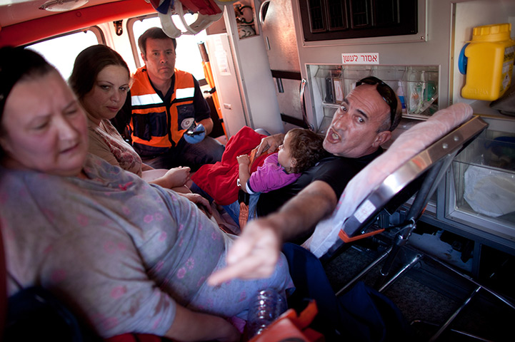 Strikes update: Israel: Israelis are evacuated in an ambulance after a rocket attack