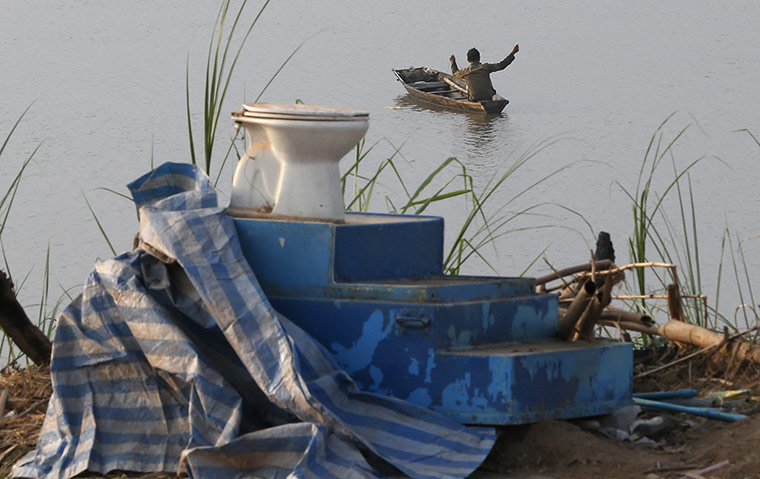 World Toilet Day: Mekong River in Vientiane, Laos   