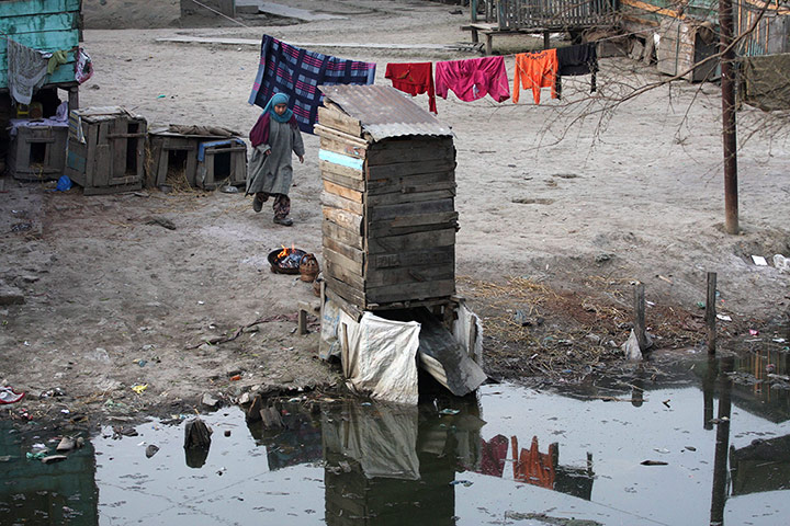 World Toilet Day: A makeshift toilet is erected by the side of a stream in Srinagar