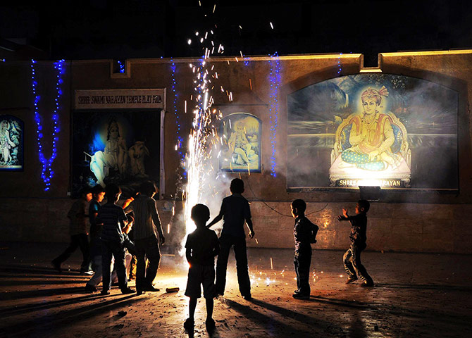 Diwali: Hindu children play with fireworks in Karachi, Pakistan