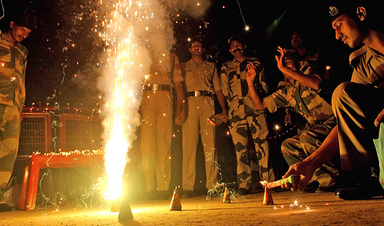 Diwali: Indian Border Force soldiers light candles and crackers