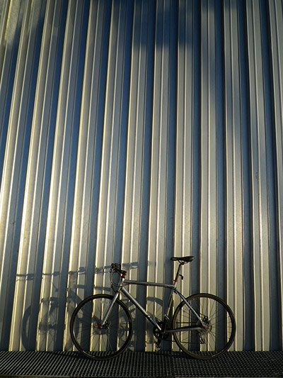 Your Pictures: Tonal: Taken at noon, a bike parked outside the Glasgow Armadillo