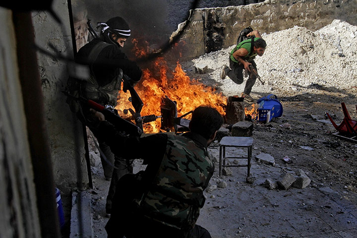 20 Photos: In Aleppo, Syrian rebels of the Halab al-Shabah battalion take position