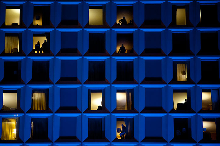 24 hours: People watch fireworks from inside their rooms in the Wyndham Hotel 