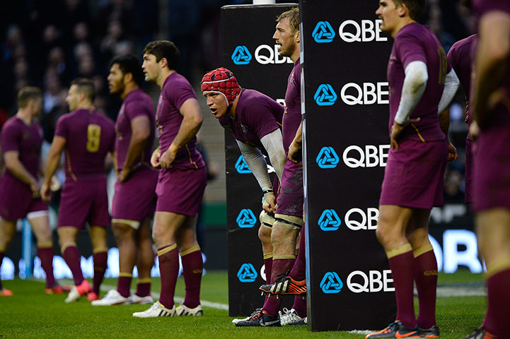eng v australia: England players line up on their own line as Berrick Barnes kicks a penalty