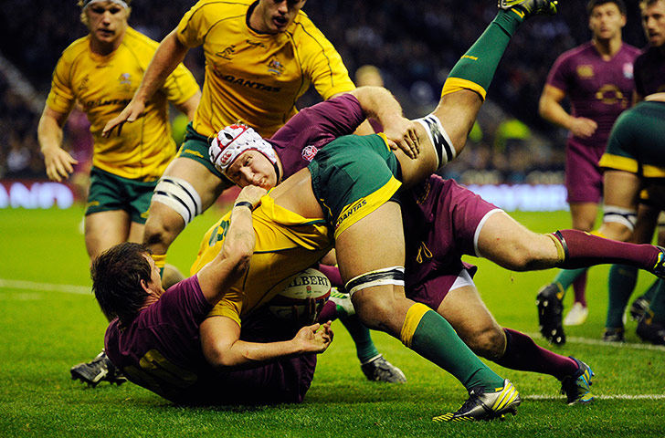 eng v australia: Australian no.8 Wycliff Palu gets double tackled 