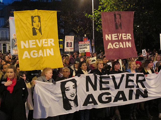 Ireland abortion row: Abortion rights protesters bearing pictures of Savita Halappanavar