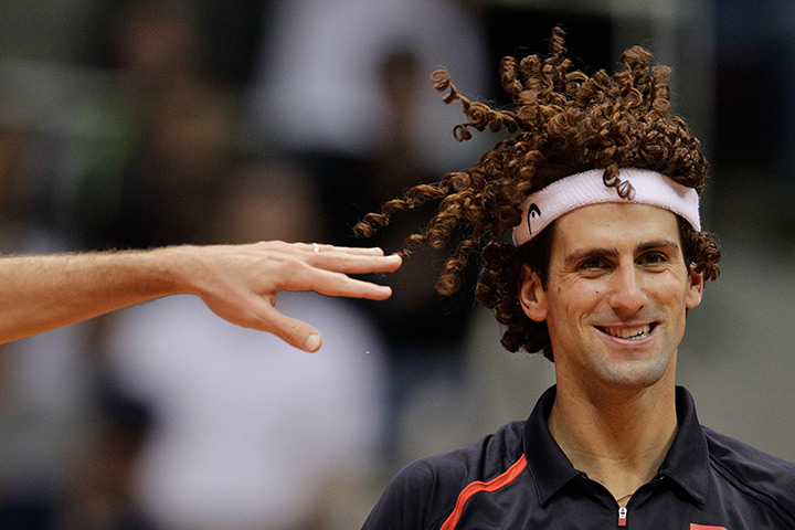 24 hours in pictures: Novak Djokovic jokingly wears a wig