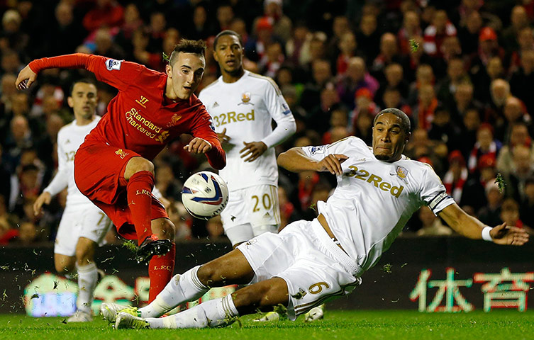week in sport pictures: Liverpool's Yesil shoots past Swansea's Williams