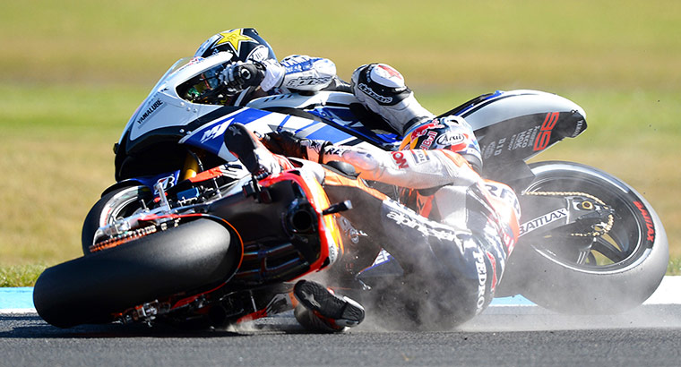 week in sport pictures: Honda rider Dani Pedrosa of Spain falls