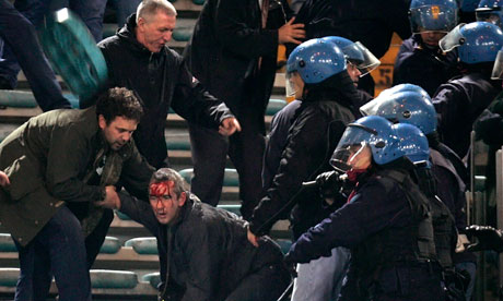 Italian riot police clash with supporters