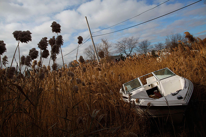 24 hours: New York, US: A boat damaged by Hurricane Sandy 
