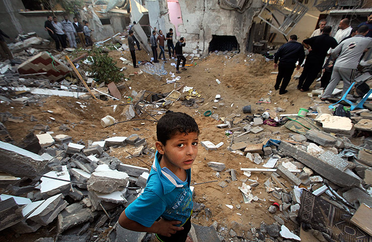 Israel Gaza : Palestinians inspect a destroyed house in Beit Lahia, in the Gaza Strip