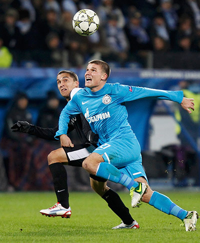 Other wed Champ league: Zenit St. Petersburg's Igor Denisov fights for the ball with Malaga's Seba