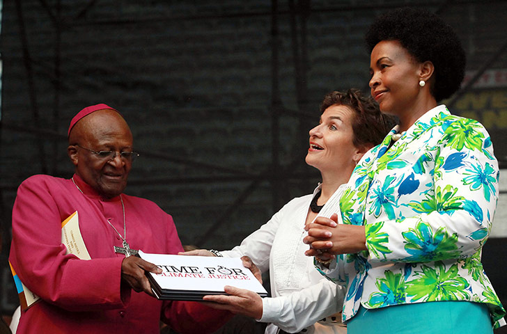 Kyoto history: Archbishop Desmond Tutu hands over a Climate Justice Diary