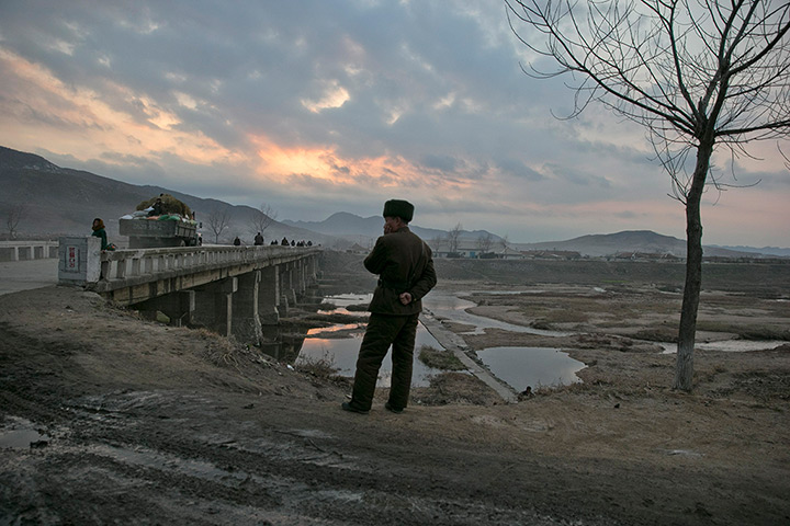 24 hours: Mount Kuwol, North Korea: A North Korean soldier stands 