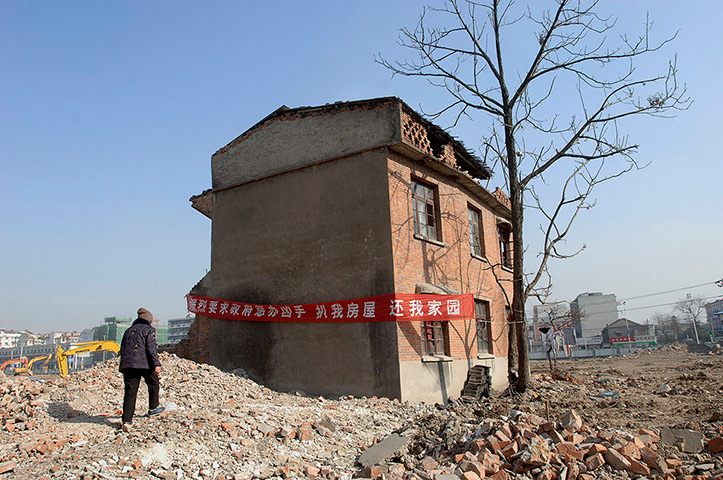 China demolition: A nail house, the last house in the area in Hefei