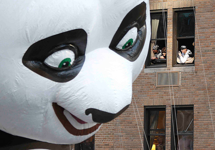 Thanksgiving: A Kung Fu Panda balloon float makes its way down 6th Ave