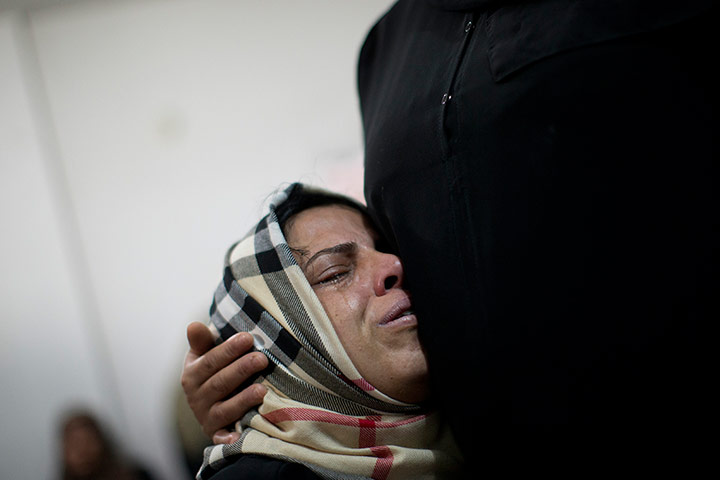 Bernat Armangue: A Palestinian relative cries during the funeral of Mohammed al-Koumi