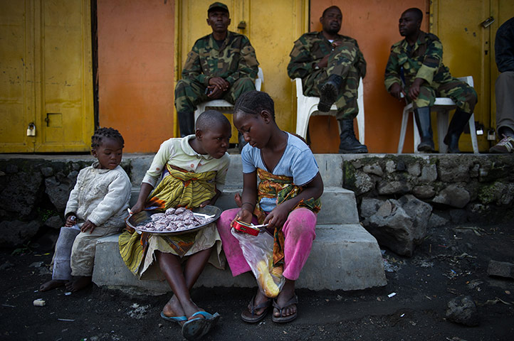 Displaced Congolese: Congolese children sit on a step in Sake