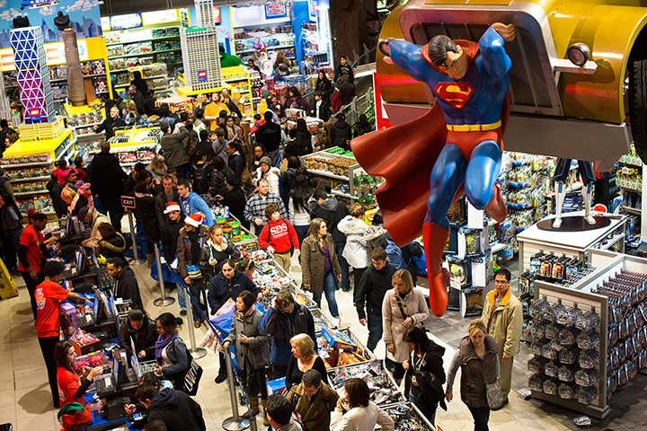 Black Friday: New York: Shoppers wait to pay in the Times Square Toys-R-Us store