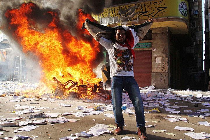 24 hours: A protester in Alexandria, Egypt