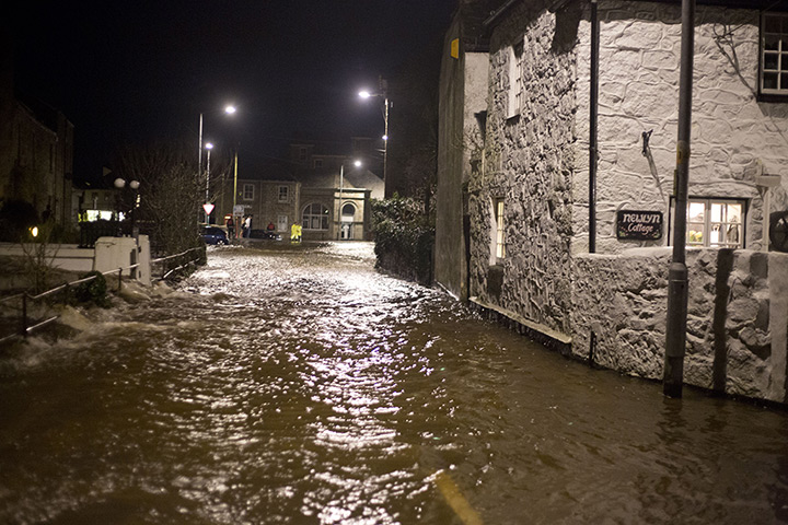 Autumn weather: Flooding in Newlyn, Cornwall, as the River Coombe bursts its banks