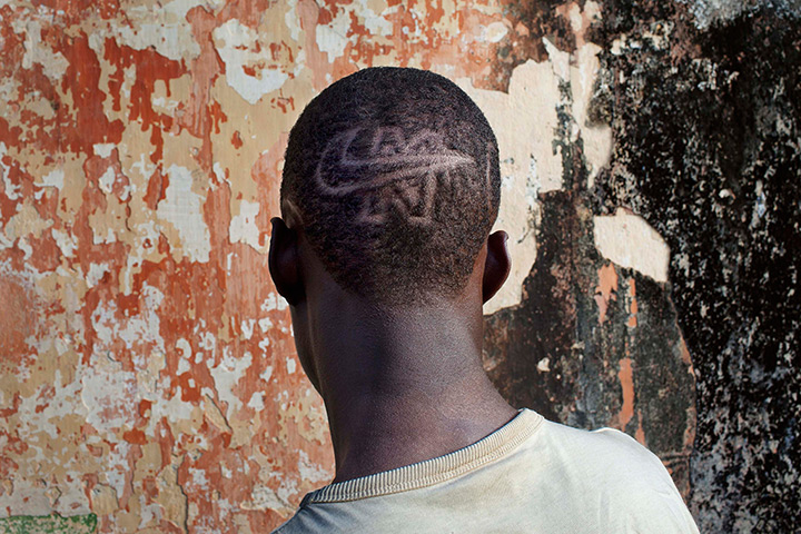 FTA: Joe Penney: Student Samba shows a Nike logo shaved into his hair