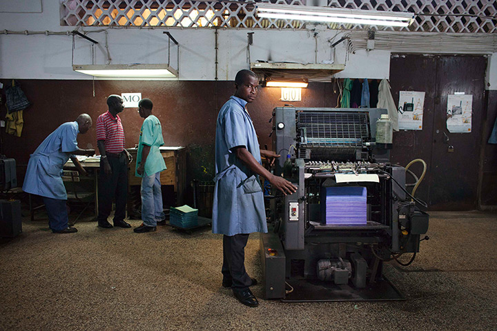 FTA: Joe Penney: Men work at Guinea-Bissau's main printing press, INACEP