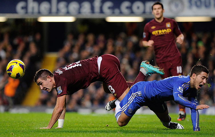chelsea v citah: Aleksandar Kolorov and Eden Hazard tangle