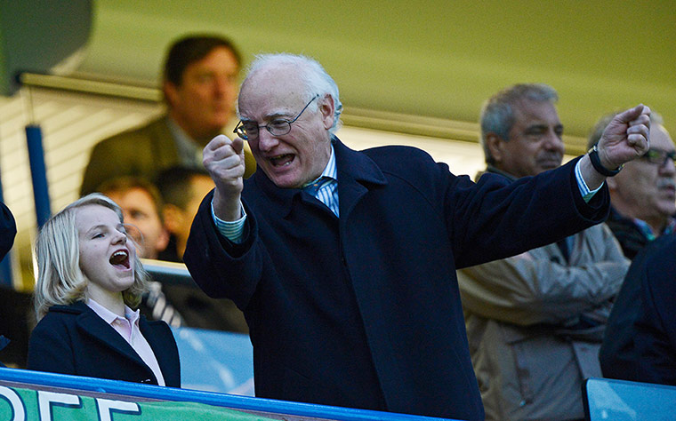 chelsea v citah: Chelsea chairman Bruce Buck encourages some cheering in the directors box
