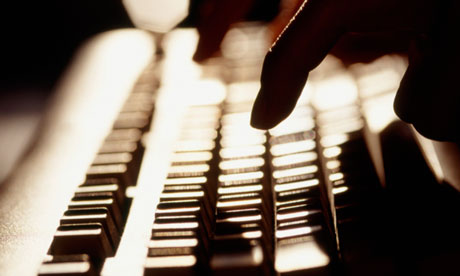 Women typing on computer keyboard