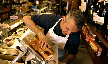 Ham slicing Italian delicatessen