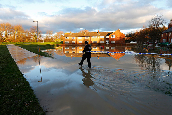 Floods clear-up: Block of flats where an elderly woman was found dead in St Asaph