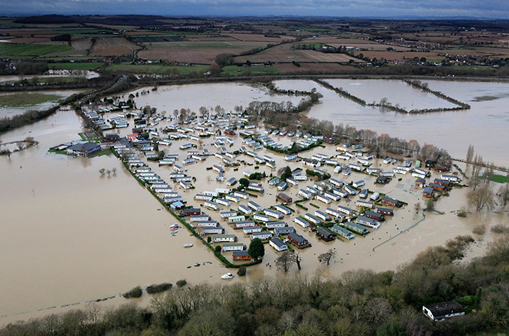 Floods clear-up: A flooded caravan park at Abbots Salford