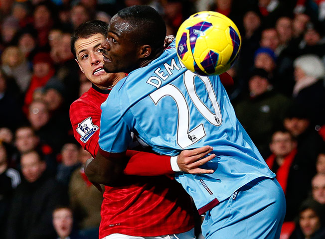 wednesday prem: Manchester United's Hernandez challenges West Ham United's Demel