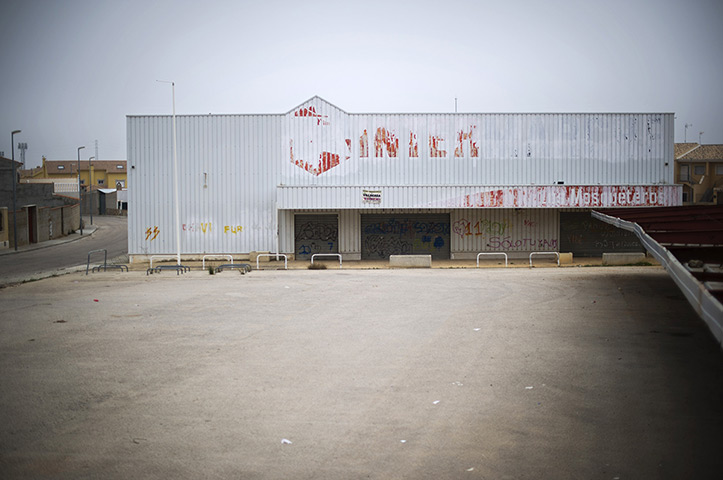 FTA: Jasper Juinen: A closed down supermarket from the Intermarche chain stands deserted 