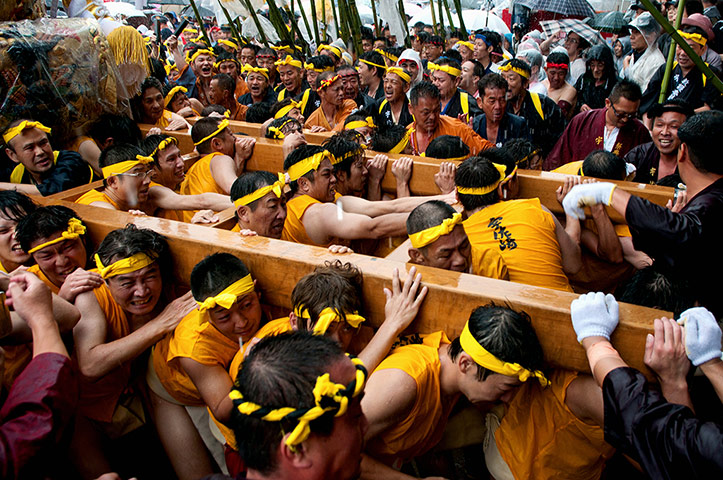 Your Pictures: Lift: Men carry a mikoshi, a portable shrine that weighs tonnes, in Japa