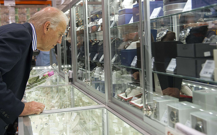 biden-at-costco: US Vice President Joe Biden looks at wat