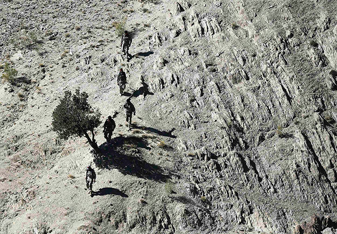 Twenty Photos: Afghan border policemen on an operation near the border with Pakistan