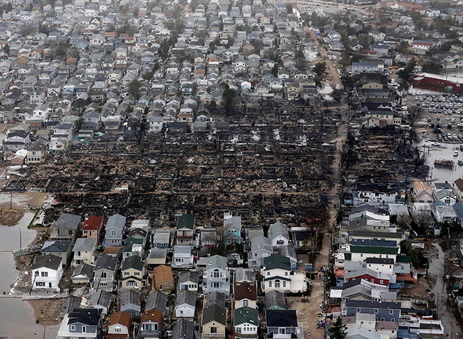 Twenty Photos: Breezy Point burned down after flooding caused by superstorm Sandy