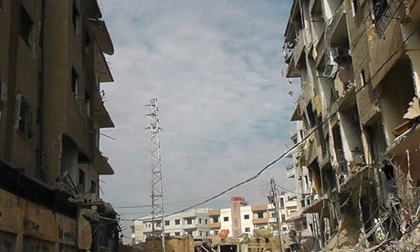 A view of buildings damaged by missiles in Daria