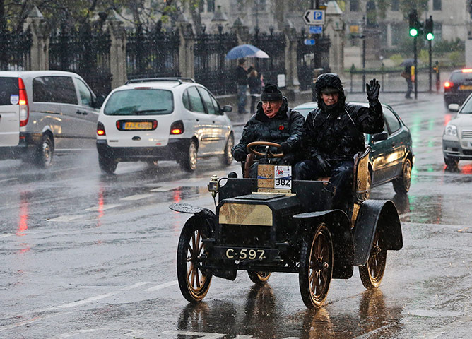 UK weather: London: Participants drive their 1904 Humberette car