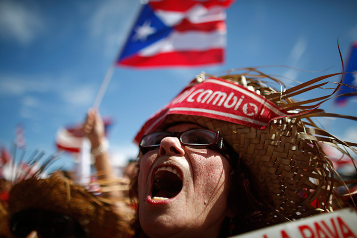 24 hours in pictures: A supporter of Alejandro Garcia Padilla in 