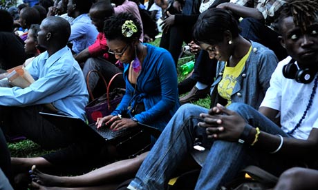 African youth with laptops