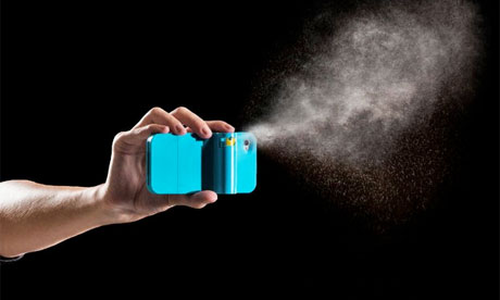 The Spraytect iPhone case emitting a mist of pepper spray