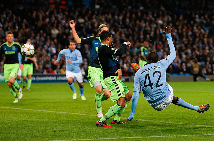 Tuesday CL action: Manchester City's Toure shoots to score against Ajax