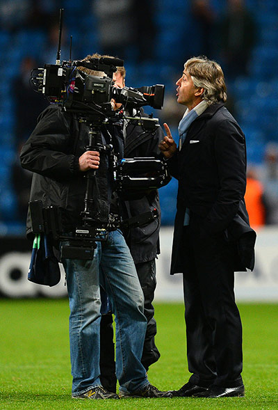 Tuesday CL action: Manchester City's Italian manager Robert Mancini