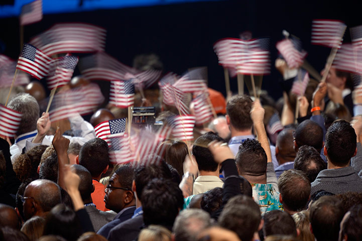 24 hours: Chicago, Illinois: Supporters of Barack Obama wave US flags