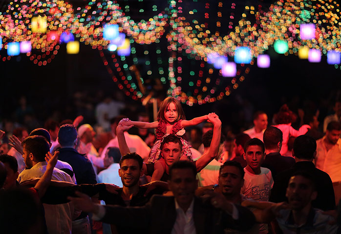 24 hours: Gaza, Palestine: A family wedding takes place in the Shati refugee camp